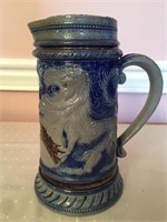 Cobalt salt glazed stoneware pitcher, relief,