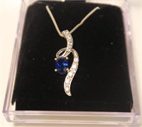 Sterling silver blue and white sapphire pendant on