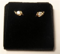 14K Yellow gold swirl style diamond stud earrings,