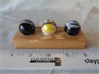 3 Large NASCAR Marbles on stand