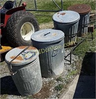 Four trash cans with lids and stand