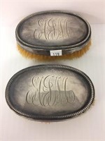 2 Sterling clothing brushes;