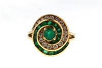 14kt Emerald and diamond ring in a swirl design