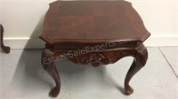 Queen Ann style wooden end table with claw foot