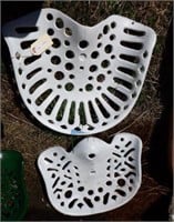 (2) antique pierced cast iron white tractor seats