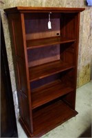 Designer Cherry four tier bookcase with raise