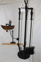 metal balance row boat and fireplace tools