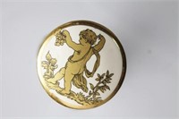 1 HATPIN GOLD PAINTED PROCELAIN CUPID OR A