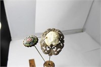 2 HATPINS 1. OVAL ENAMELED, 2. - SHELL CAMEO