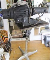 Simplot antique projector on stand