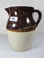 8" brown/beige stoneware pitcher