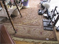 96" x 64" fringed area rug
