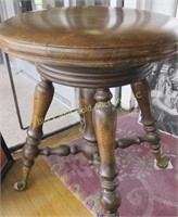 Walnut ball and claw foot organ stool