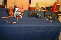 Antique binoculars and camera