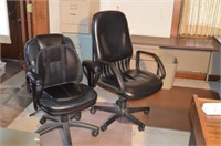 2 black desk chairs