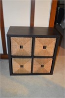 Black storage cube with beige storage baskets