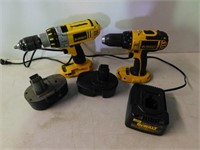 Two Dewalt drills c/w two batteries.& charger