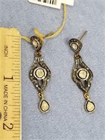 Pair of silver and diamond earrings, custom cast w