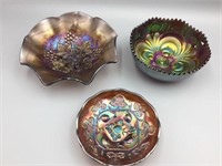 Three purple amethyst glass bowls