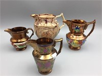 4 Copper luster creamers and pitcher