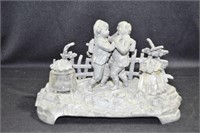 POT METAL DESK SET - DEPICTS 2 BOYS WITH BACK