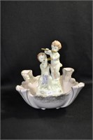 2 PANS PLAYING FLUTES IN BOWL - 8" HIGH X 8 1/2"