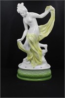 LADY WITH BACK LEG UP - YELLOW WITH GREEN BASE -