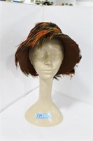 COMPOSITE HAT STAND WITH FEATHERED HAT AN