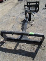 Backhoe Attachment for a Skid Steer,