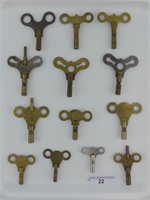 TRAY: 13 BRASS & STEEL CLOCK KEYS