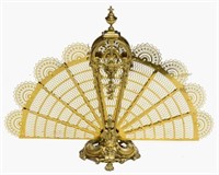 ORNATE GILT BRASS LION MASQUE FAN FORM FIRESCREEN