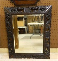 Well Carved Oak Framed Beveled Mirror.