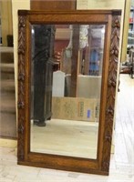 Foliate Carved Oak Framed Beveled Mirror.