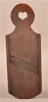Antique Cherry Slough Board with Heart Cut-out.