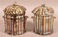 Two Similar Glazed Pottery Covered Canisters.