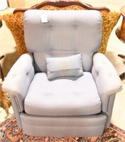 Blue upholstered reclining chair