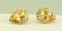 Pair of marked 10kt gold with yellow Tanzanite