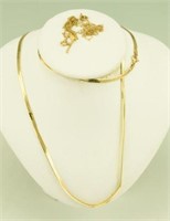 (3) Marked 14kt gold necklaces