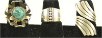 (3) Sterling and marked .925 rings: one floral