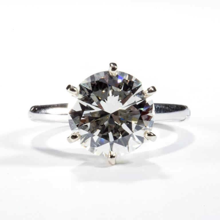Estate-fresh high-grade 5.5 ct. diamond solitaire ring