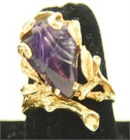 Marked 14kt gold floral ring with amethyst stone