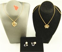 (2) 10kt gold necklaces with pendants including