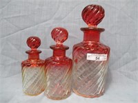 3 Rose Baccarat perfume and cologne bottles