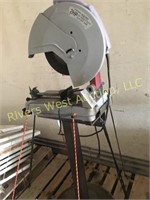Metal chopsaw on stand