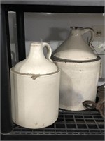 TWO (2) STONEWARE JUGS ~ SOME CHIPS . SM JUG