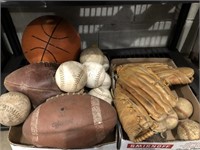 VARIETY OF VINTAGE SPORTS BALLS AND GLOVES