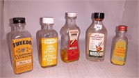 5 vintage extract bottles