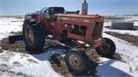 Allis Chalmers D17 tractor with blade