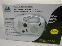Brand new solar and crank radio with flashlight