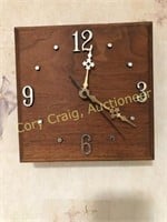 Pair of wood battery operated wall clocks